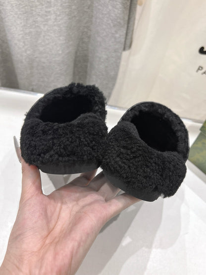 GUCCI HORSEBIT MULE IN BLACK CALFSKIN AND FLEECE LINING