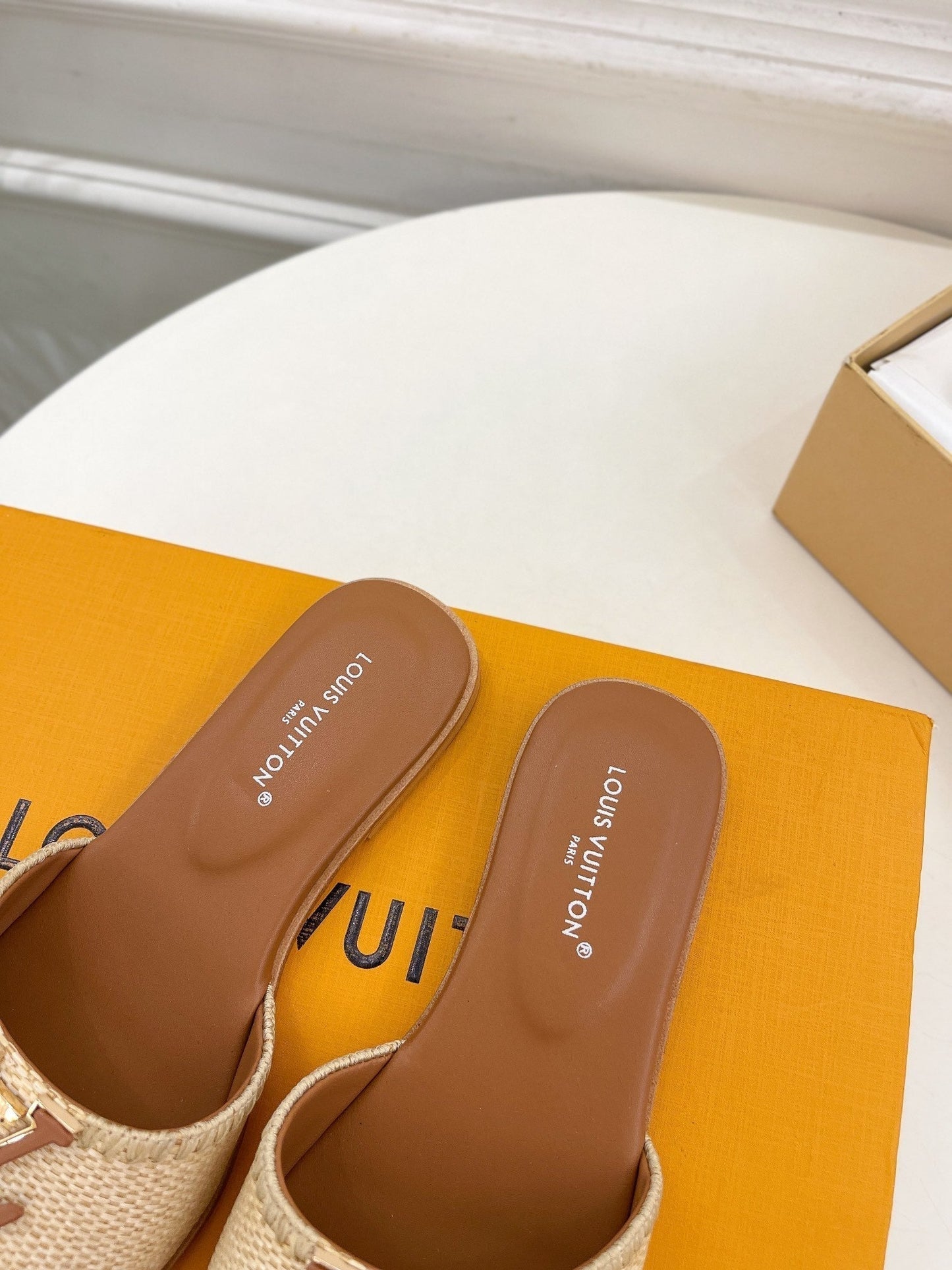 LOUIS VUITTON LV WOMEN CAPRI FLAT MULES IN CHOCOLATE BROWN LEATHER AND RAFFIA